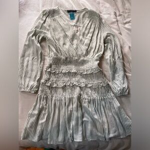 White and Green Striped Boutique Dress. Form fitting around waist